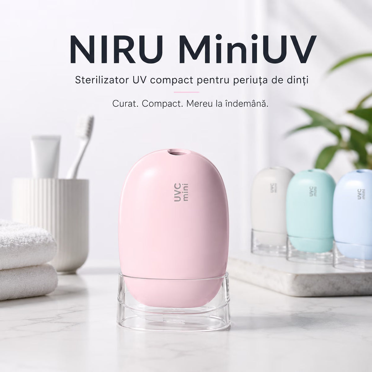 Sterilizator UV compact pentru periuța de dinți NIRU MiniUV, roz, prezentat pe blat de baie.