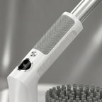 Prim-plan cu mânerul alb al periei electrice NIRU, grip gri, afișaj 86% și tub telescopic metalic